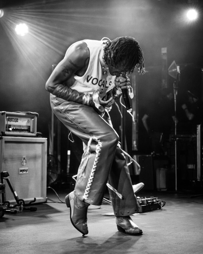 Duckwrth dancing across the stage during a concert at Treefort Music Hall
